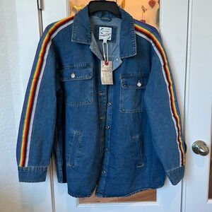 Denim on denim is trending! This is a showstopper jacket! Live the trim!